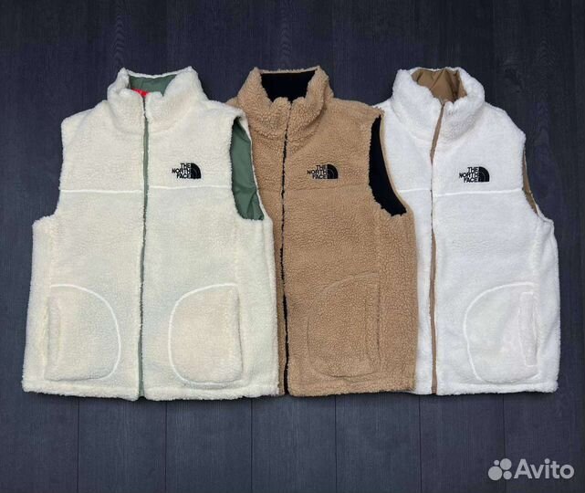 Меховая жилетка новая