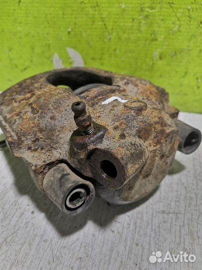 Суппорт передний левый Киа Сепия Шума 96-01