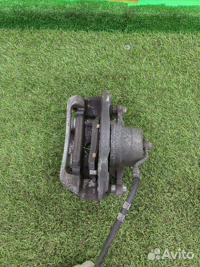 Суппорт передний правый Kia Sportage 4 QL