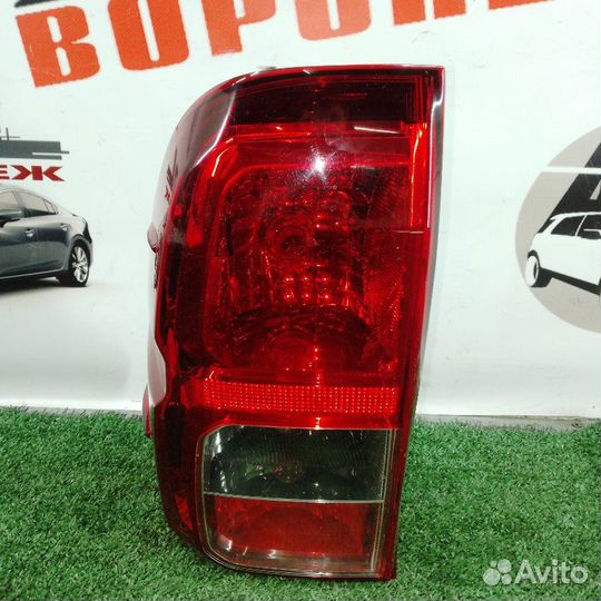 Фонарь задний левый Toyota Hilux Pick Up AN120