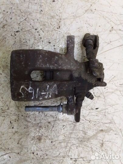 Тормозной суппорт задний правый Opel Astra H 2006