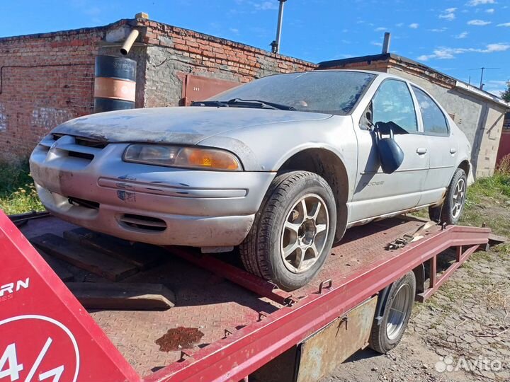 Dodge Stratus передний бампер