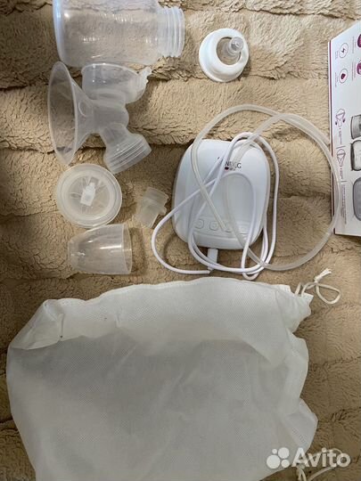 Молокоотсос электрический и пакеты для молока