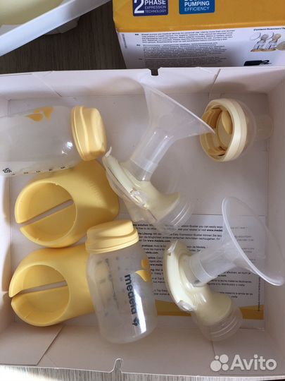 Молокоотсос электрический medela swing maxi