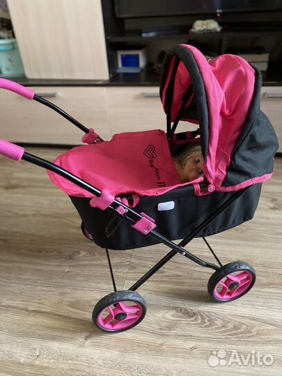 Детская игрушечная коляска