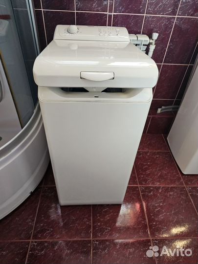 Стиральная машина с вертикальной загрузкой