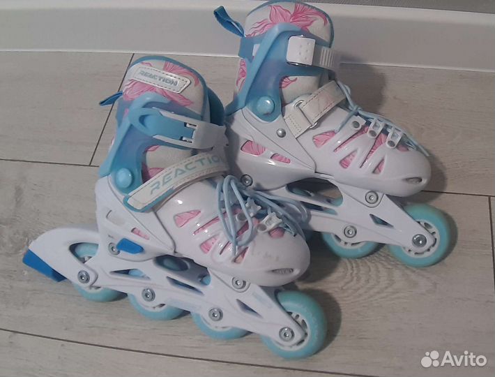 Роликовые коньки