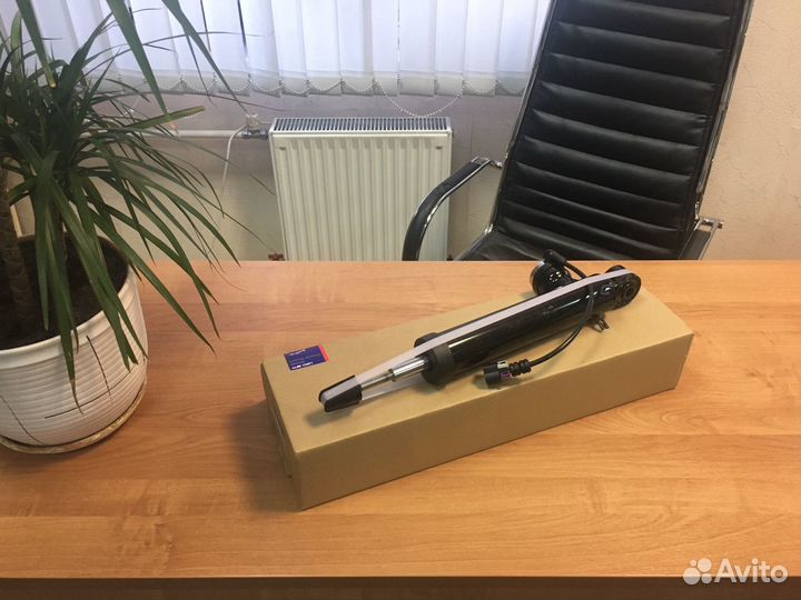 Амортизатор задний Cadillac SRX 2010-2016 LH