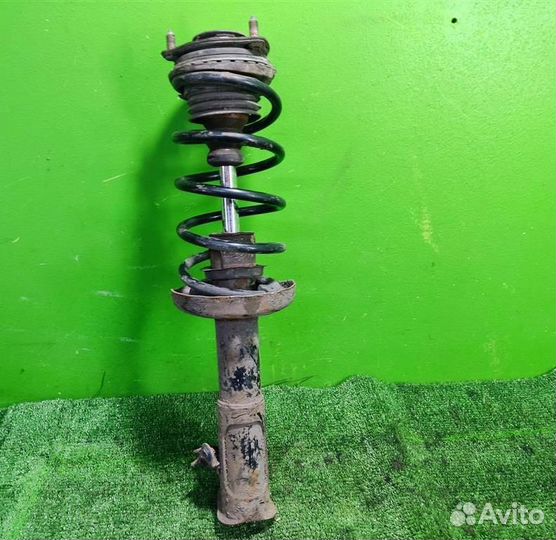 Стойка амортизатора передняя левая Honda Civic 4D