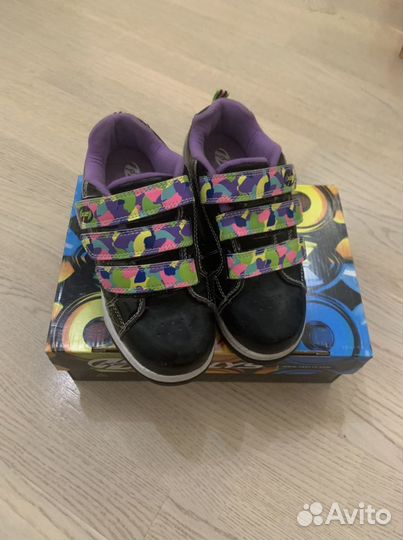 Кроссовки роликовые