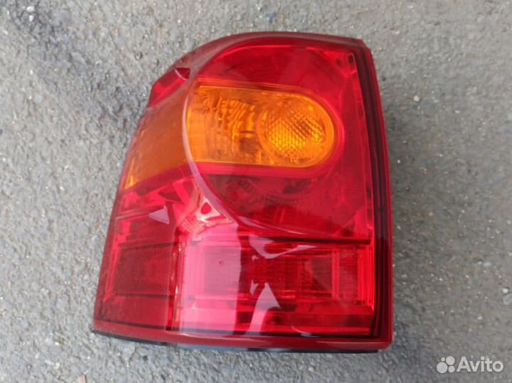 Фонарь задний левый на крыло Тойота 200