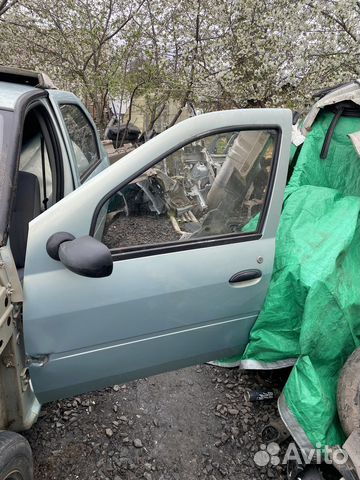Передняя левая дверь Renault Логан лада ларгус