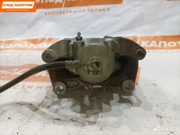 Суппорт тормозной передний левый Nissan Teana J32