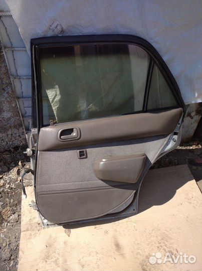 Дверь боковая задняя правая Toyota Corolla CE110
