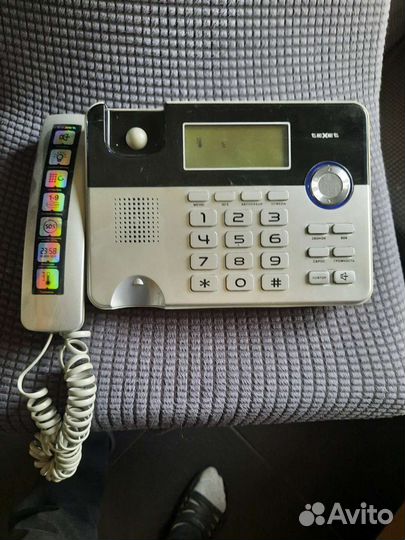 Телефон тхит