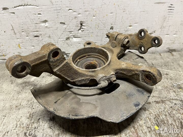 Кулак передний левый Kia Sportage 3 SL 10-16г