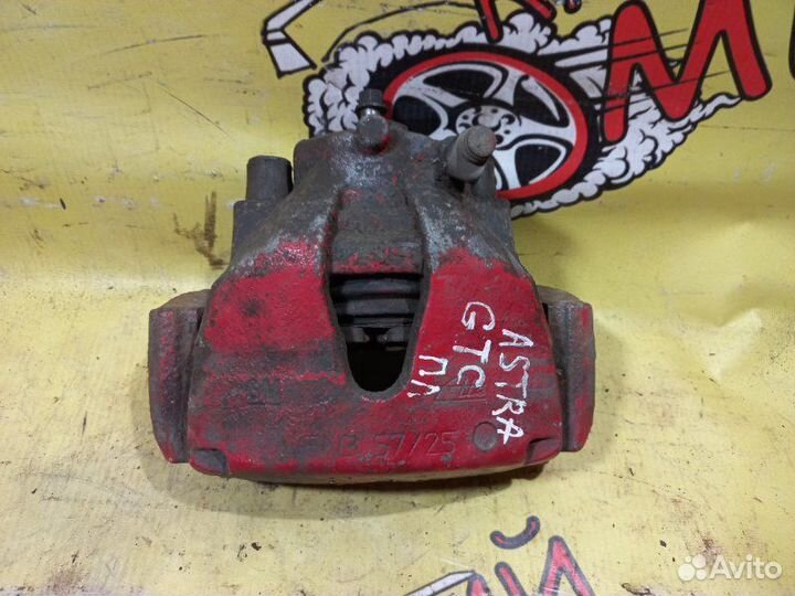 Суппорт тормозной передний левый Opel Astra H GTC