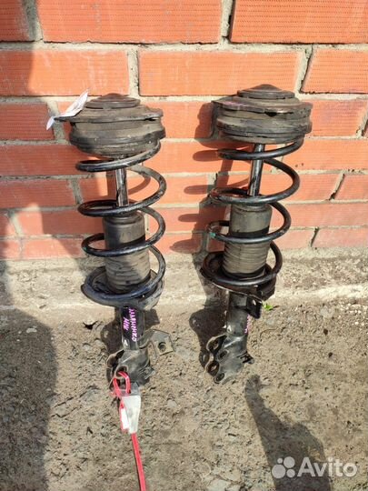 Стойка амортизатор передняя nissan tiida c11