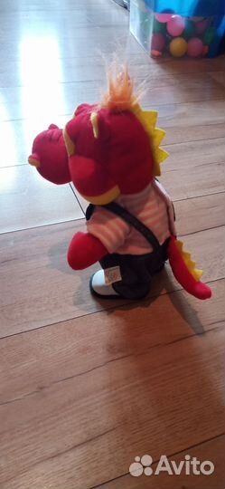 Музыкальный динозаврик