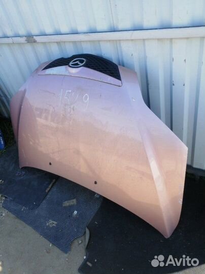 Капот Mazda Demio DY