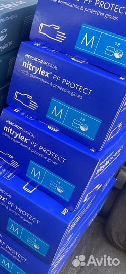 Перчатки нитриловые