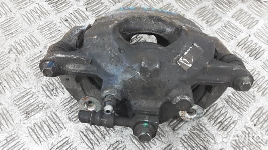 Суппорт тормозной передний левый chevrolet trax (9