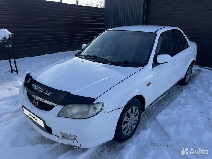 Mazda Familia 1.5 AT, 2003, 200 000 км