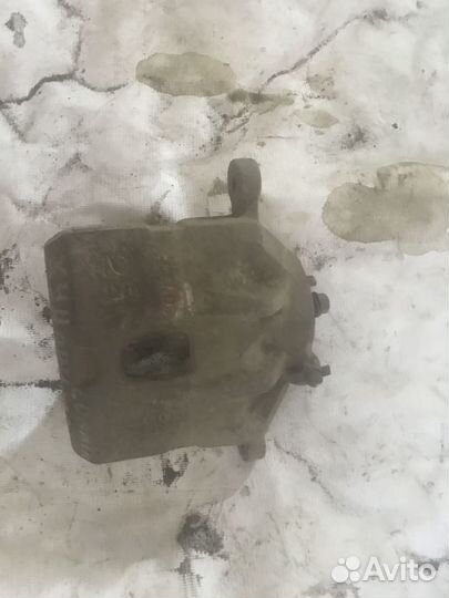 Суппорт тормозной передний левый Hyundai Sonata