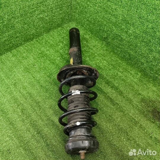 Стойка амортизатора передняя правая Opel 13368263