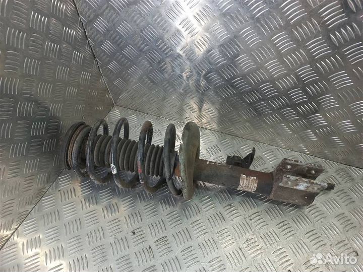 Стойка амортизатора передняя левая Ситроен Berli