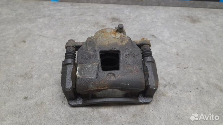 Суппорт передний левый Peugeot 301 1.2 (72) MT