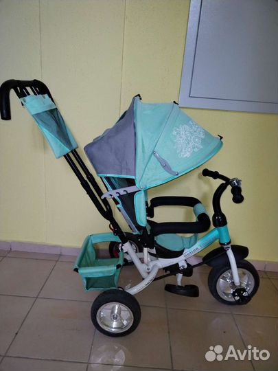 Детский велосипед с ручкой