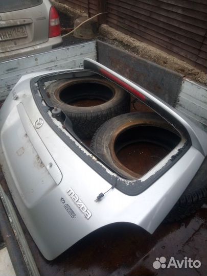 Крышка багажника мазда фамилия,323f