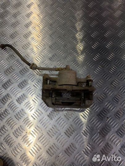 Суппорт тормозной передний левый Chevrolet Aveo