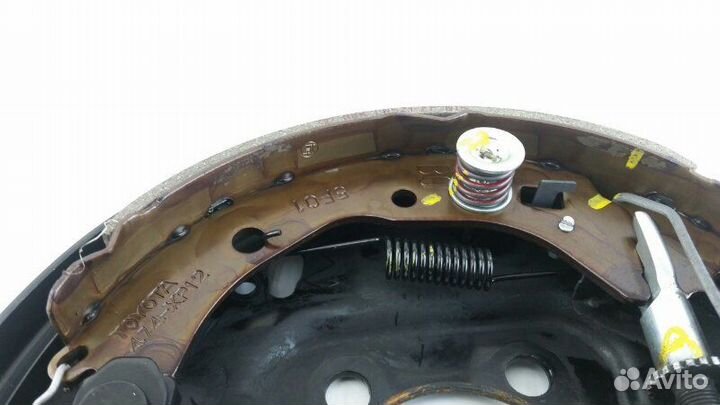 Механизм тормозной задний левый Toyota Corolla