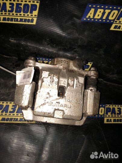 Суппорт тормозной задний правый Subaru Impreza