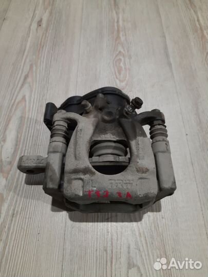 Суппорт тормозной задний Nissan X-trail T32 Лев