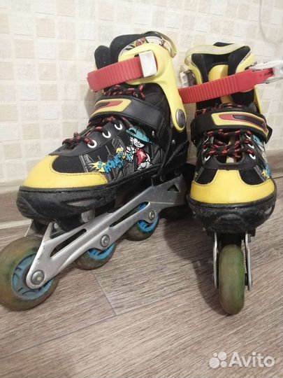 Роликовые коньки