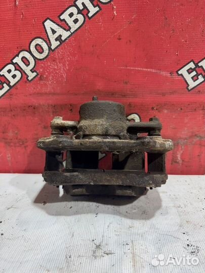 Суппорт тормозной передний правый Suzuki Grand