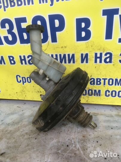 Вакуумник тормозной Mitsubishi Lancer