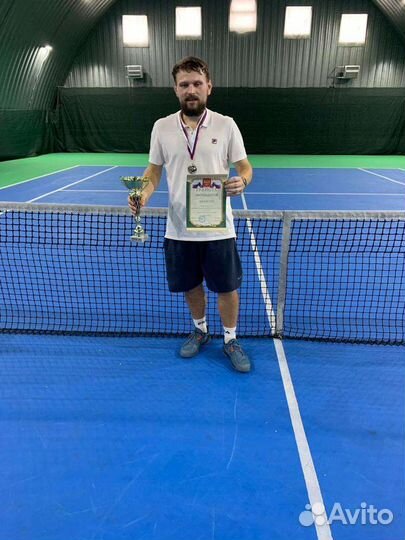 Тренер по большому теннису
