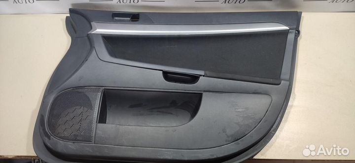 Обшивка двери передней правой Mitsubishi Lancer 10