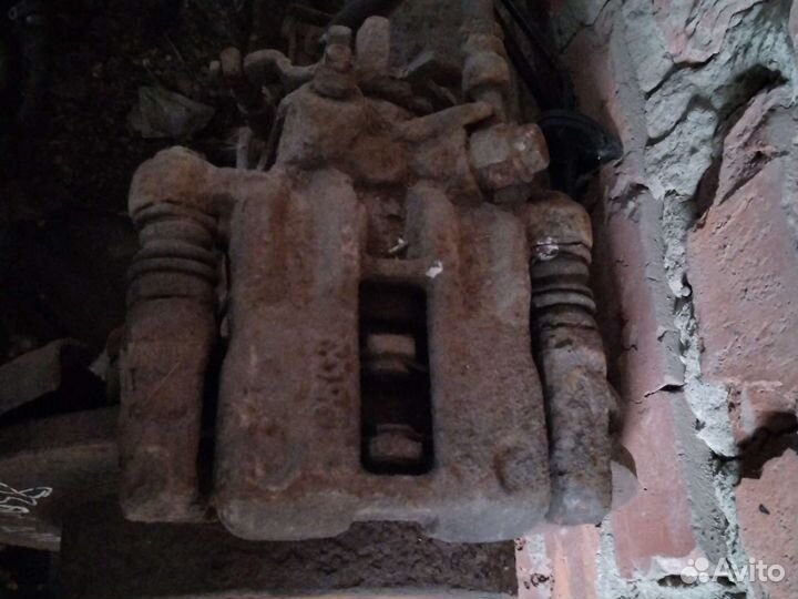 Супорта задние ниссан альмера н16 левый