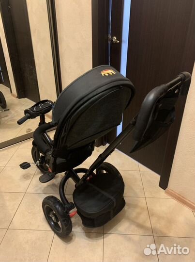 Трехколесный велосипед с ручкой