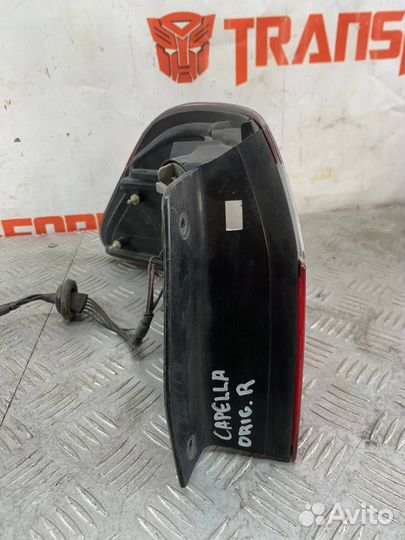 Фонарь правый Мазда Капелла