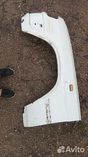 Переднее левое крыло на газ 3110