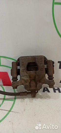 Суппорт задний правый Nissan Qashqai J10 HR16DE