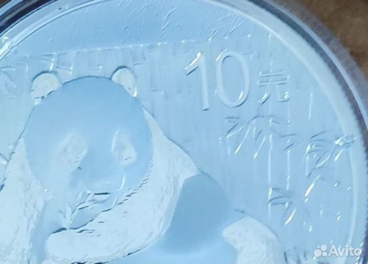 Серебряная монета Китай панда