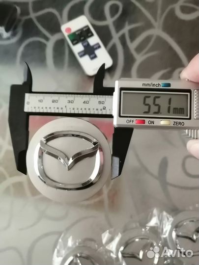 Колпачки заглушки на литые диски mazda