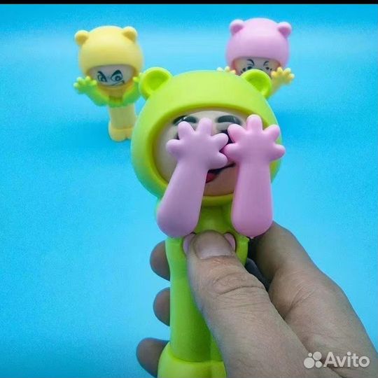 Игрушка, меняющие при нажатии,выражение лица